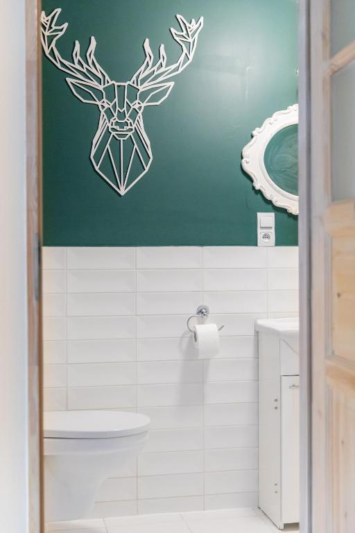 Kúpeľňa v ubytovaní Apartamenty Przylesie