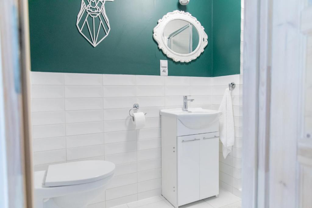 Kúpeľňa v ubytovaní Apartamenty Przylesie