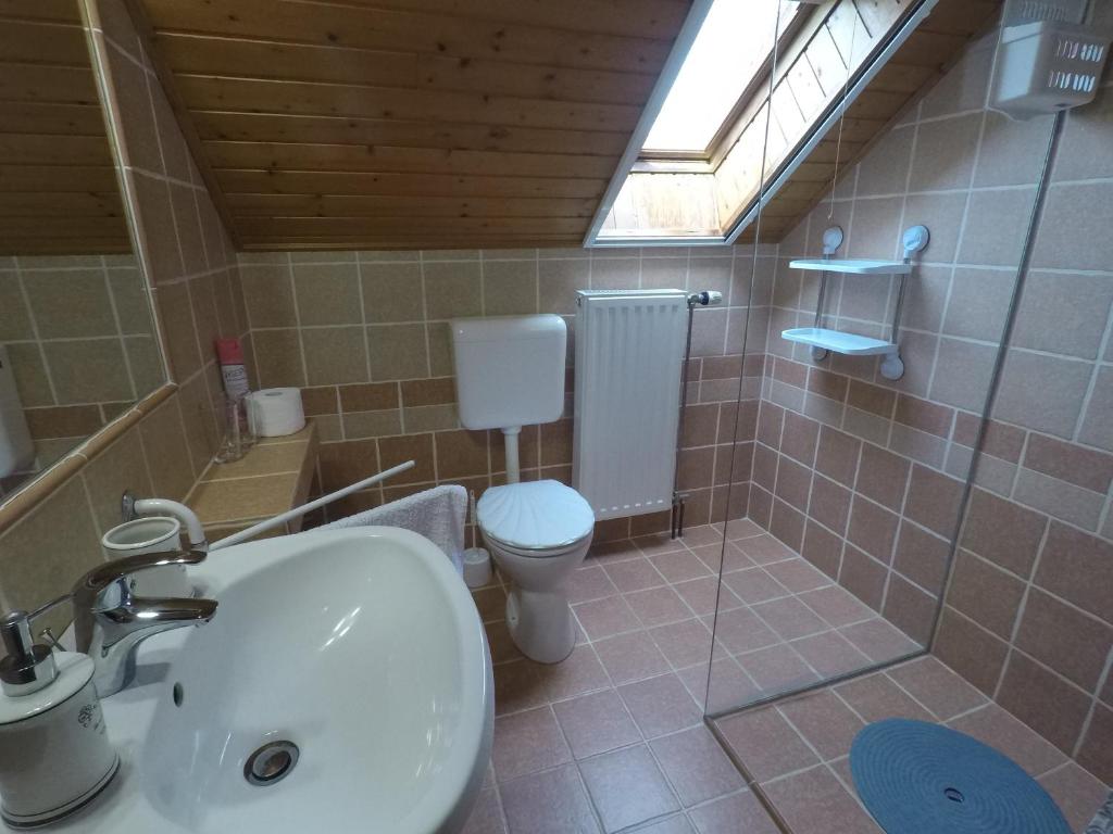 Kúpeľňa v ubytovaní Napsütötte Kehida