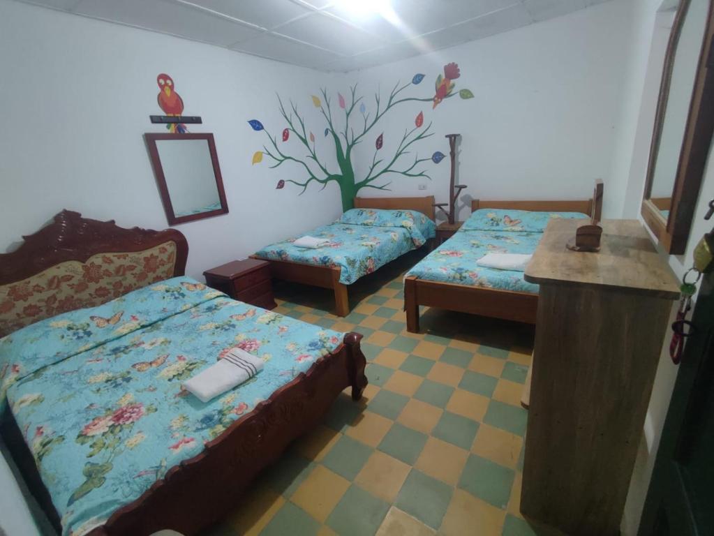 Llit o llits en una habitació de Hostal Donde Jose