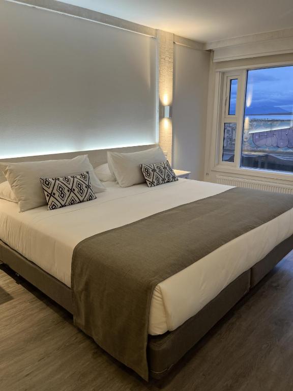 Postel nebo postele na pokoji v ubytování Hotel Costanera