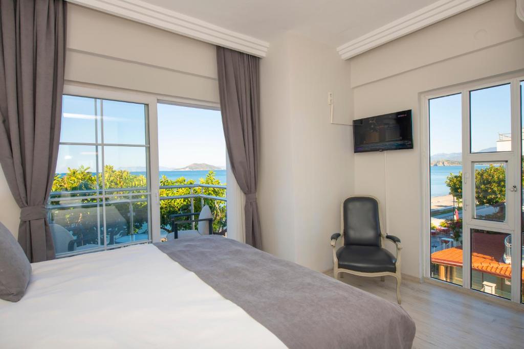Postel nebo postele na pokoji v ubytování Mia Casa Hotel