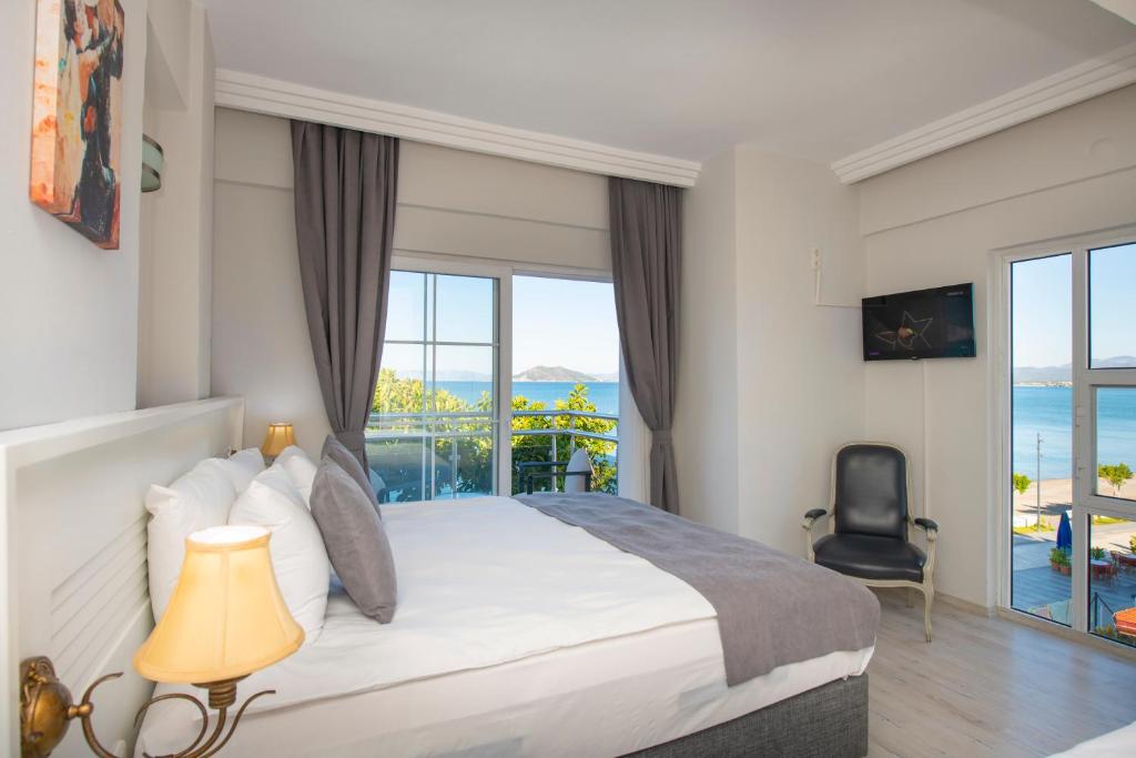Postel nebo postele na pokoji v ubytování Mia Casa Hotel