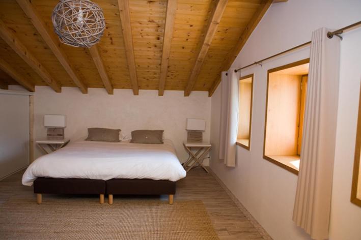 Postel nebo postele na pokoji v ubytování Hotel Residence Alaïa