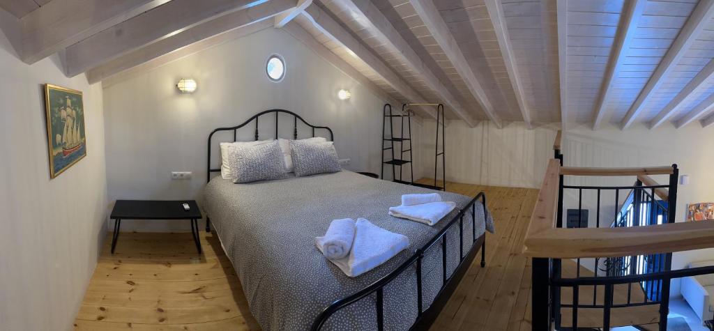 Postel nebo postele na pokoji v ubytování Casa Porphyra