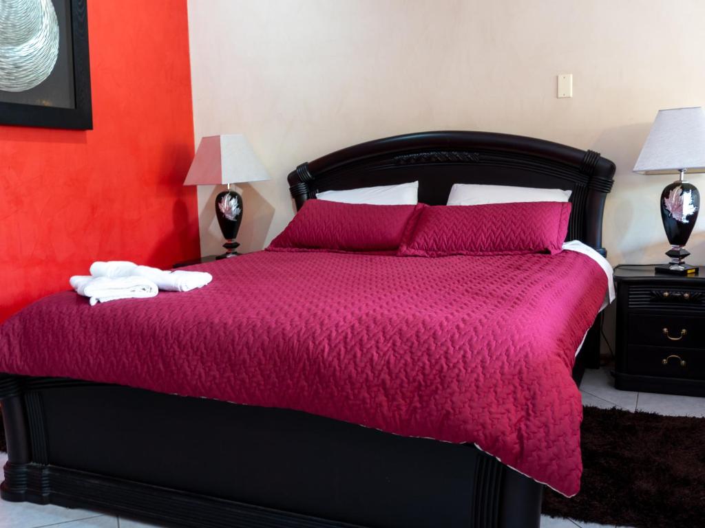Postel nebo postele na pokoji v ubytování Chaupimundo Lodge