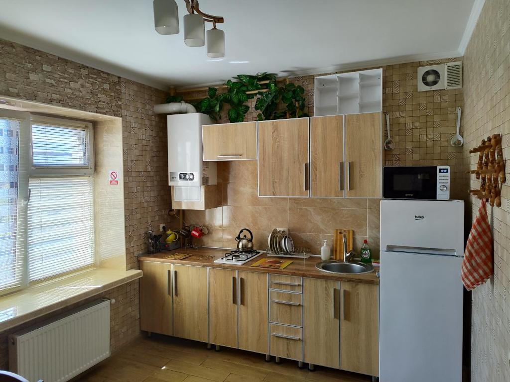 Kuchyň nebo kuchyňský kout v ubytování Апартаменти в новому будинку біля Либідь Плаза-Квартал