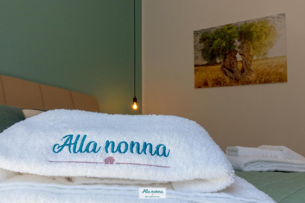 Postel nebo postele na pokoji v ubytování Alla nonna