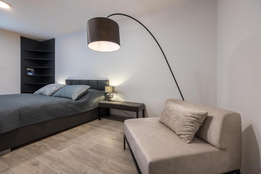 Postel nebo postele na pokoji v ubytování Apartmány Na Lánech