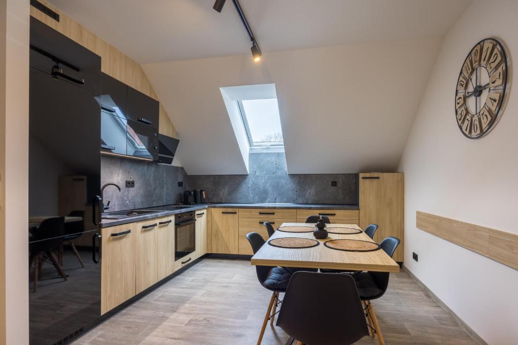 Kuchyň nebo kuchyňský kout v ubytování Apartmány Na Lánech