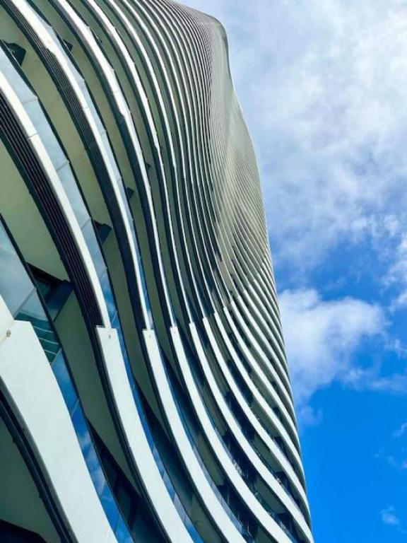 a close up of a building with the sky in the background at Oracle 11th floor Tower 1 - GC Getaways in Gold Coast