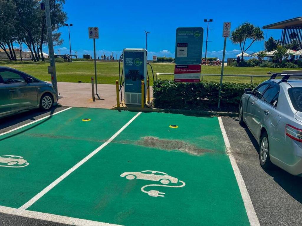 a parking lot with a car parked next to a gas station at Oracle 11th floor Tower 1 - GC Getaways in Gold Coast