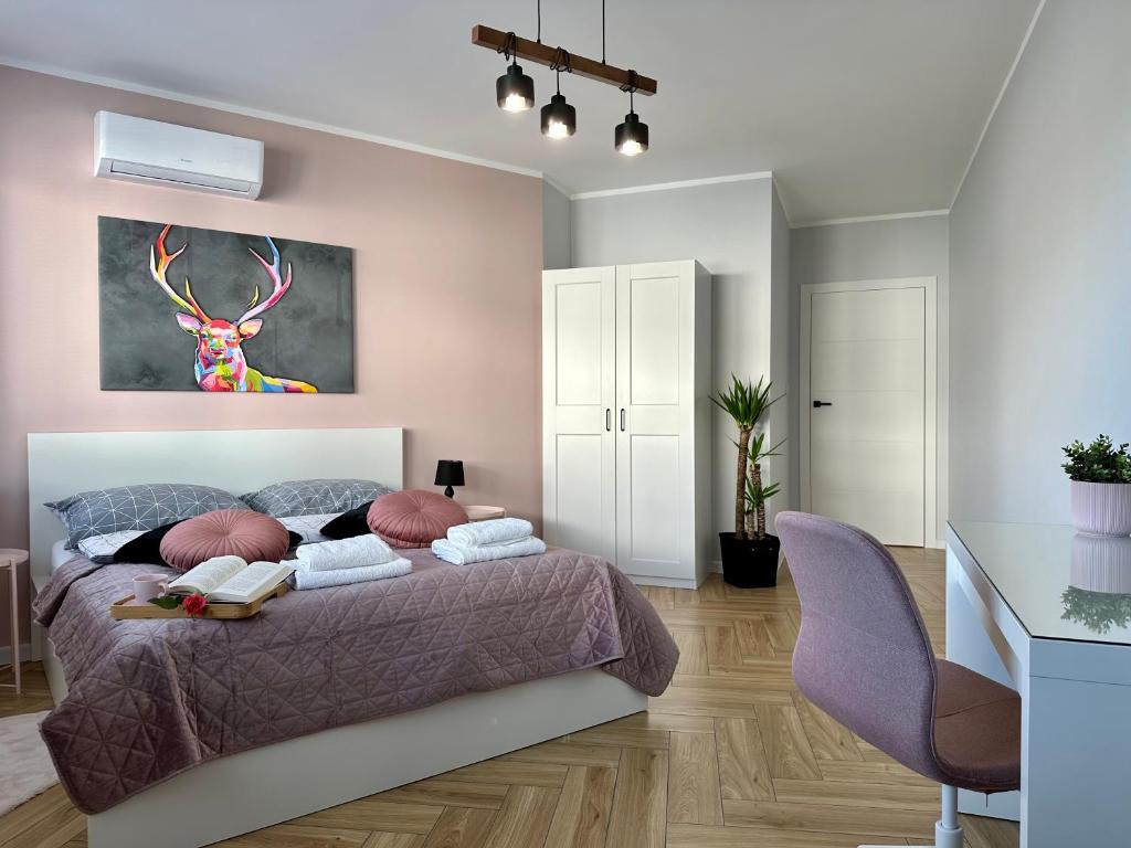 Posteľ alebo postele v izbe v ubytovaní Apartament Ukiel No9 z prywatnym dostępem do jeziora i siłownią