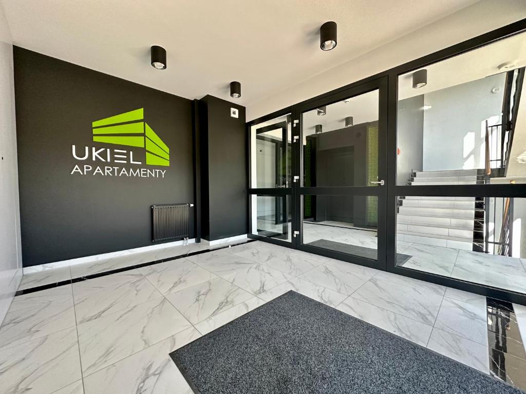 Certifikát, ocenenie alebo iný dokument vystavený v ubytovaní Apartament Ukiel No9 z prywatnym dostępem do jeziora i siłownią