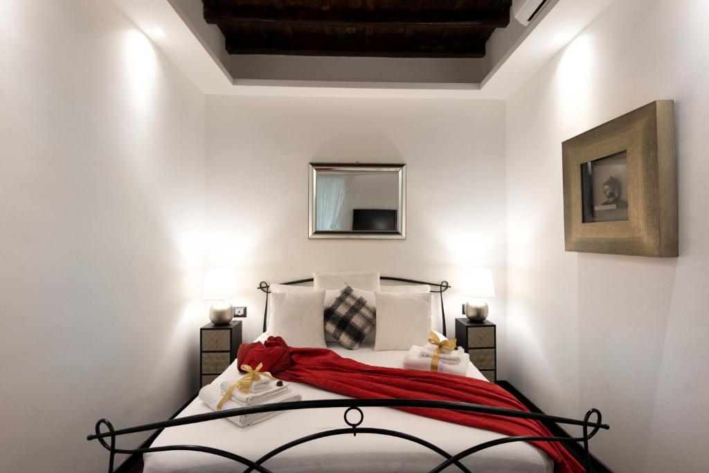 Barcaccia Luxury Suites 객실 침대