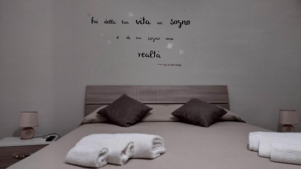 Ein Bett oder Betten in einem Zimmer der Unterkunft A Cas rà Biond