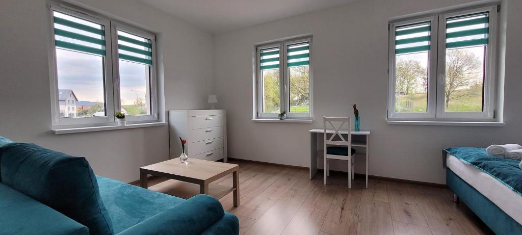Posezení v ubytování Kolorowe Cieplice - Apartamenty z widokiem na Karkonosze