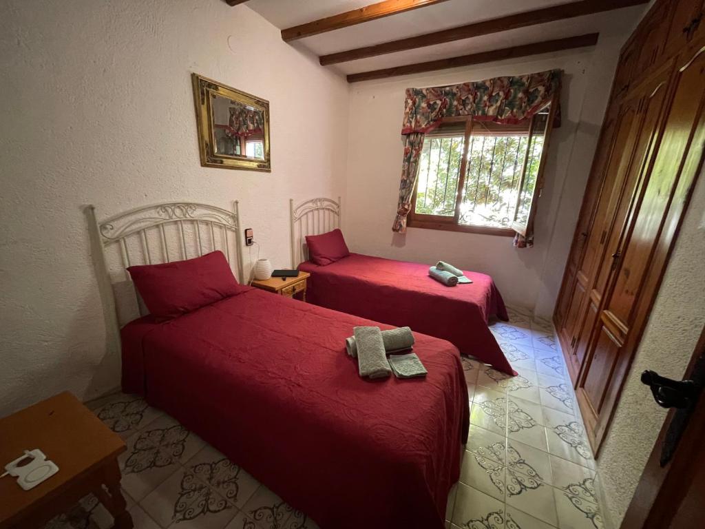 Postel nebo postele na pokoji v ubytování Villa GAN EDEN