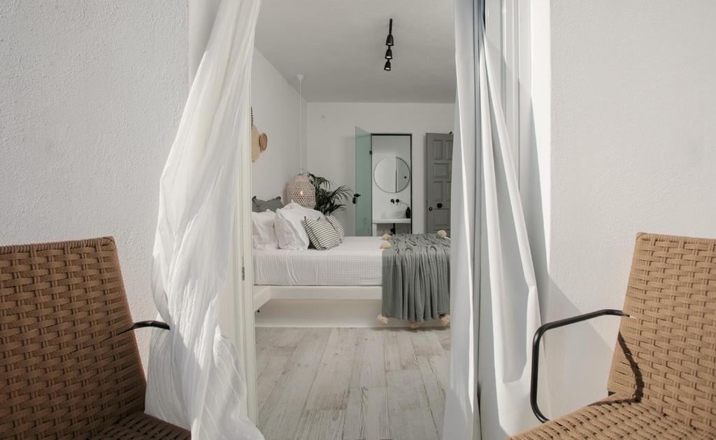 Postel nebo postele na pokoji v ubytování Naxos Hotel Poseidon