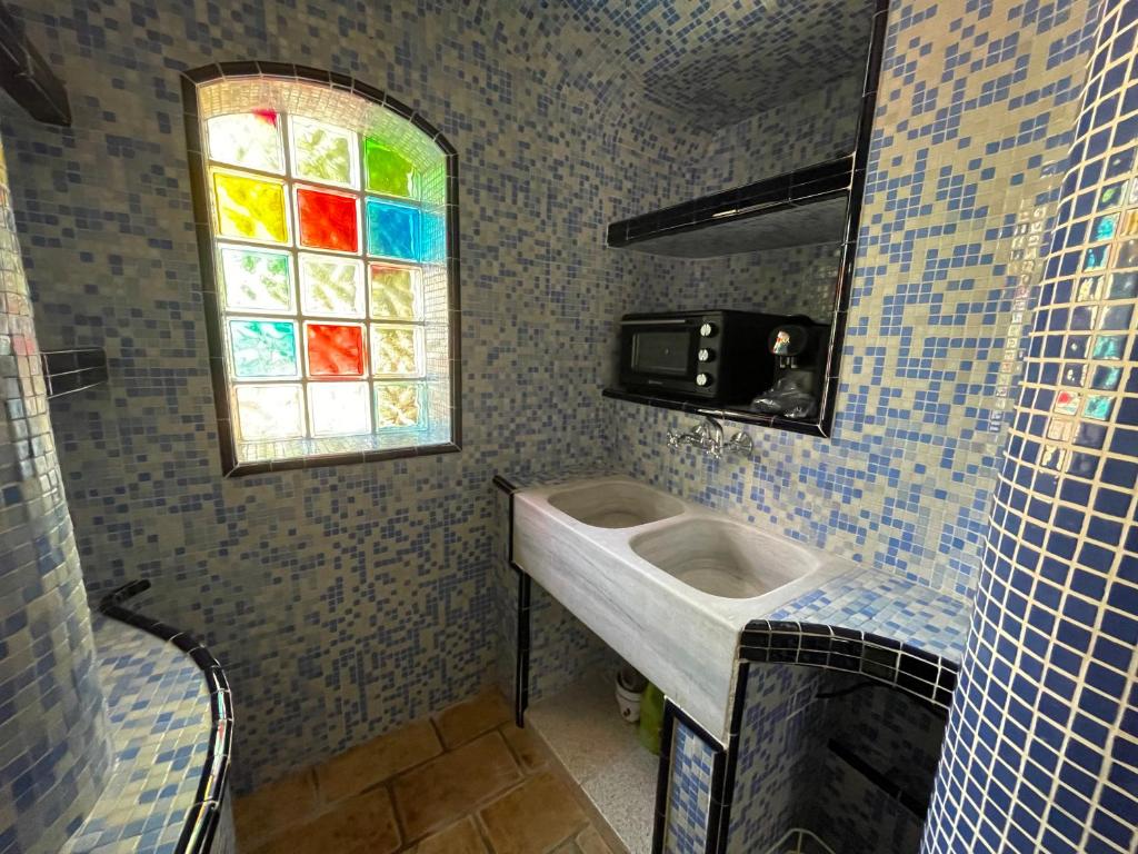 TV a/nebo společenská místnost v ubytování Villa GAN EDEN