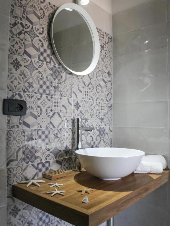 Ванная комната в La Dimora apartments