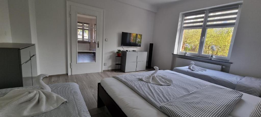 Postel nebo postele na pokoji v ubytování Vila Věrka