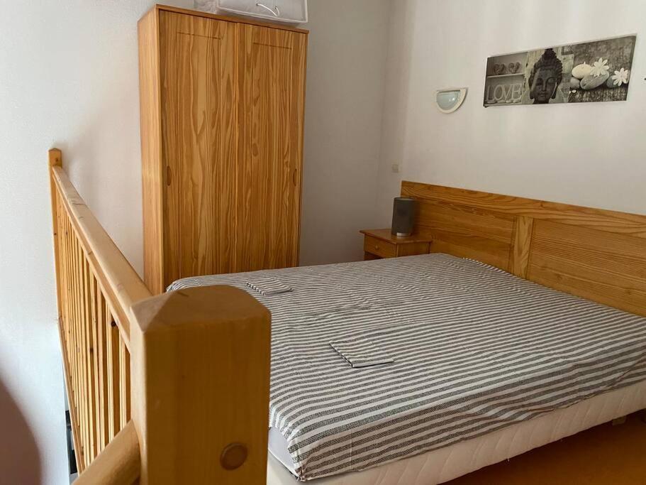 Postel nebo postele na pokoji v ubytování Appartement résidence Odalys mas des vignes