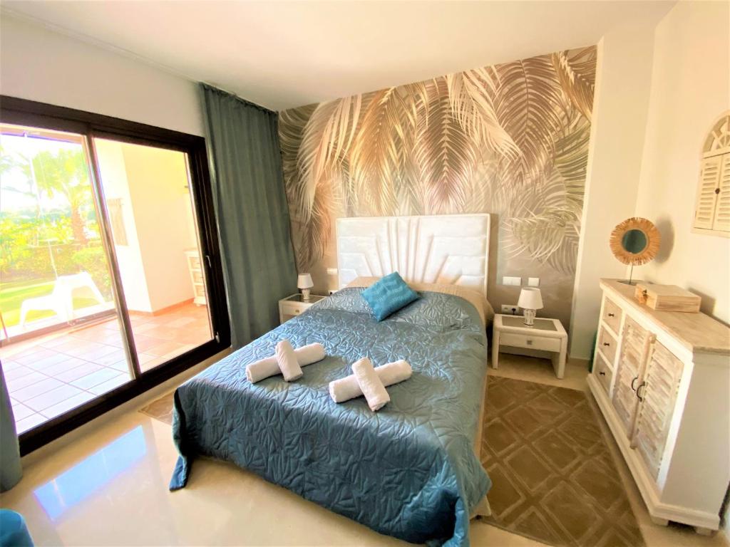 Posteľ alebo postele v izbe v ubytovaní Breathtaking apartment, Paradise Palm View Marbella
