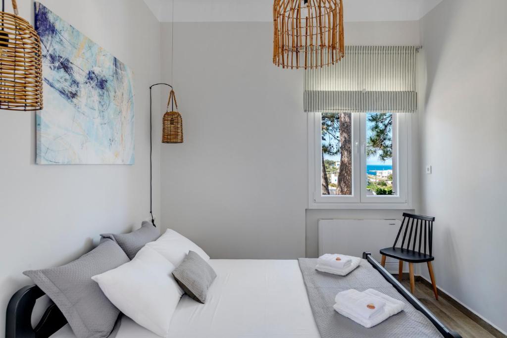 Postel nebo postele na pokoji v ubytování Villa Mare Syros