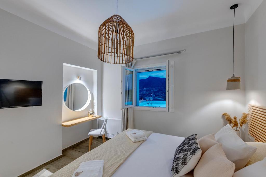 Postel nebo postele na pokoji v ubytování Villa Mare Syros
