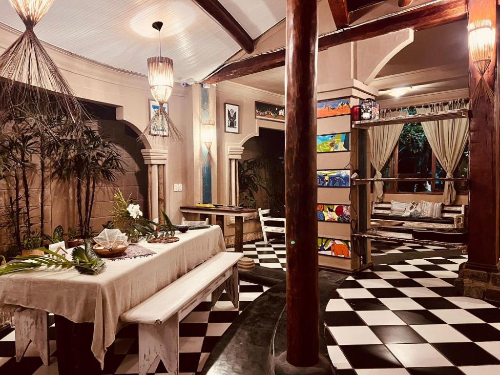Posezení v ubytování Na Casa 11 - Pousada e Hostel