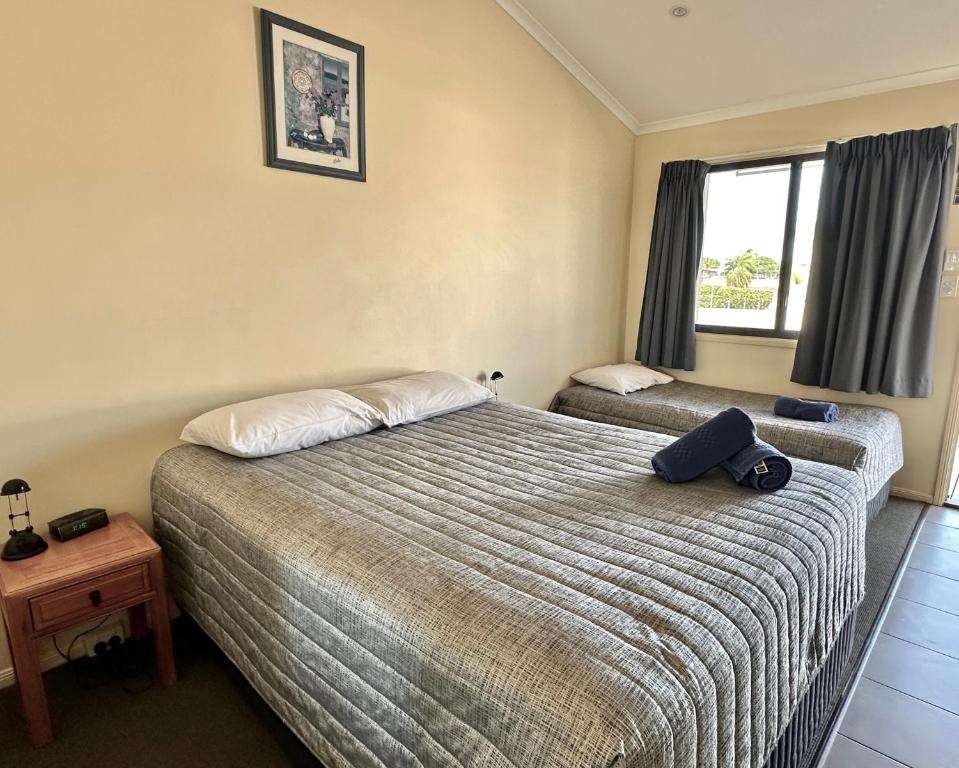 Postel nebo postele na pokoji v ubytování Moura Motel
