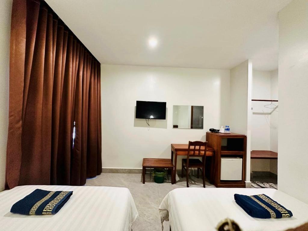 Postel nebo postele na pokoji v ubytování Laluna Guesthouse