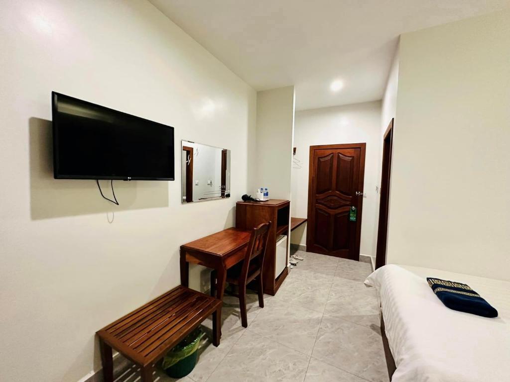 TV a/nebo společenská místnost v ubytování Laluna Guesthouse