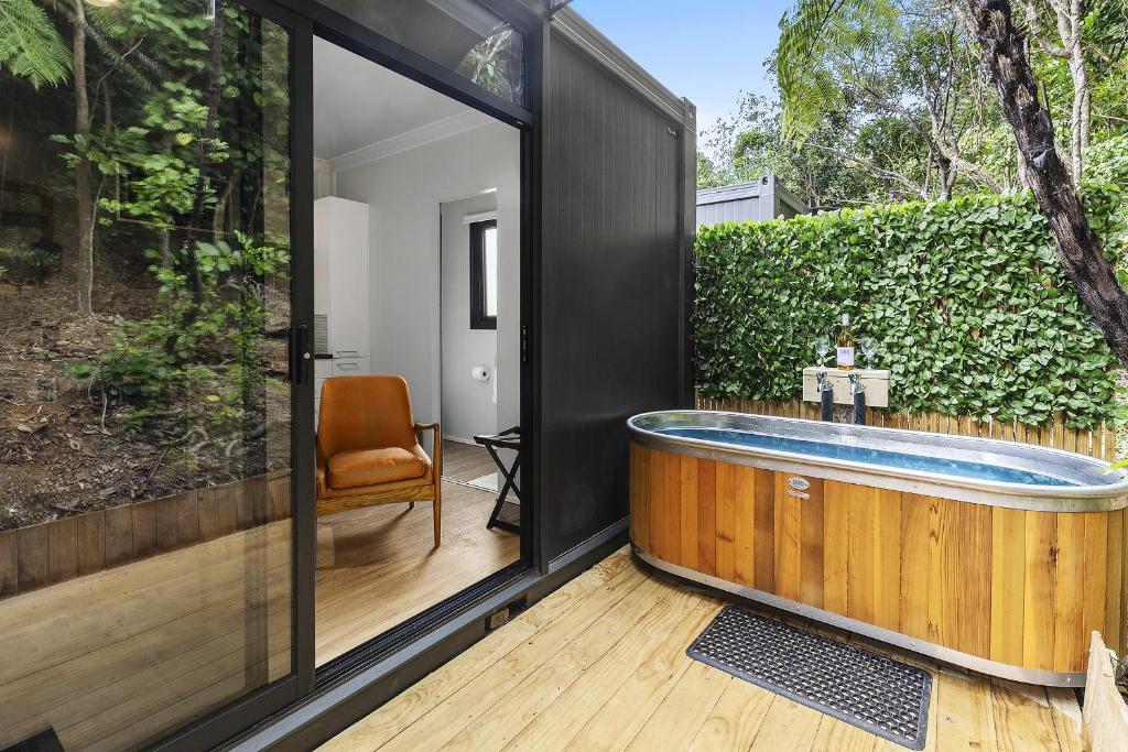 a jacuzzi tub in the backyard of a house at 2 Peas In A Pod in Wellington