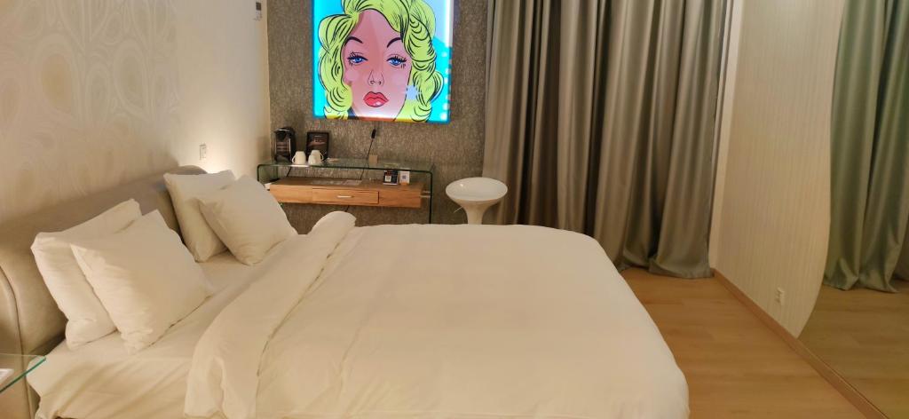 Posteľ alebo postele v izbe v ubytovaní Mirada Hotel