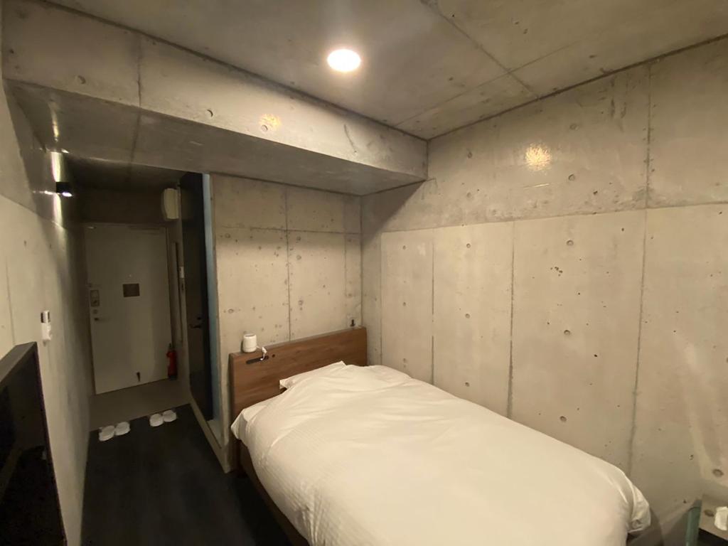 maejima Hotelにあるベッド