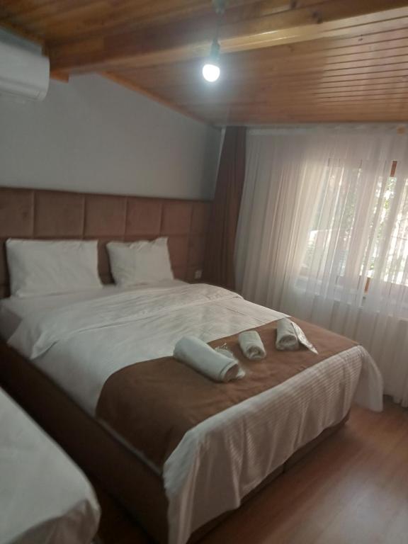 A bed or beds in a room at Terra Apart Taksim