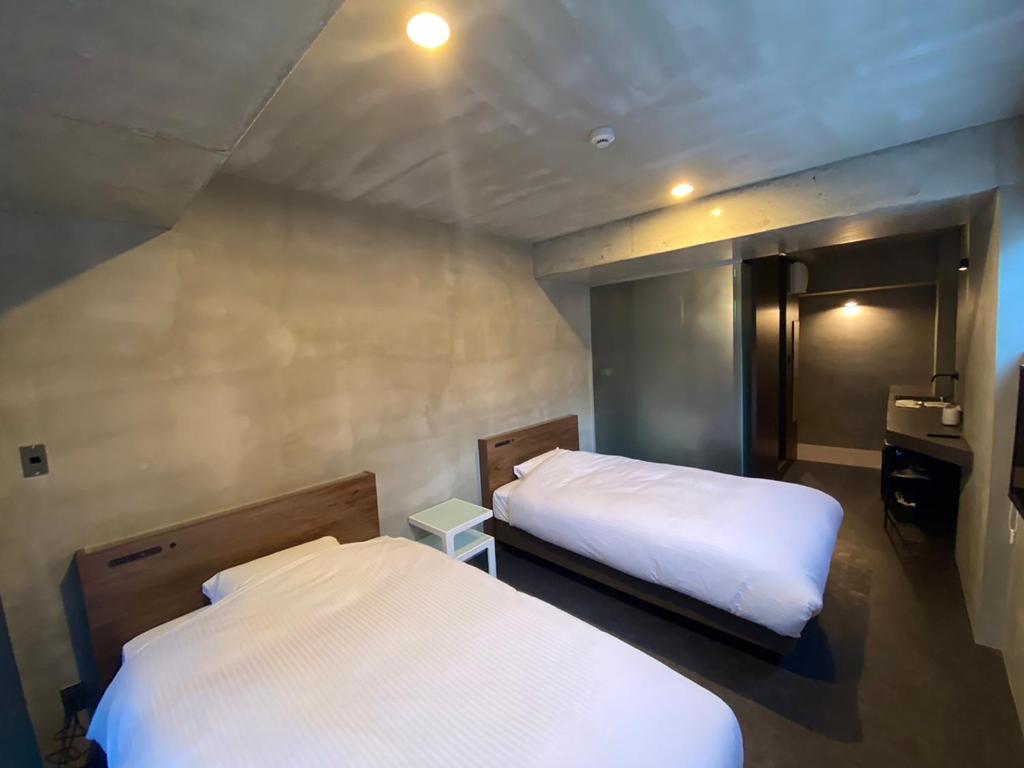 maejima Hotelにあるベッド