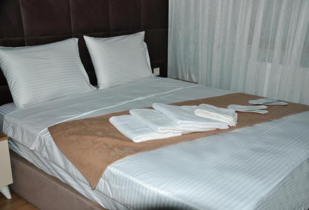 A bed or beds in a room at Terra Apart Taksim