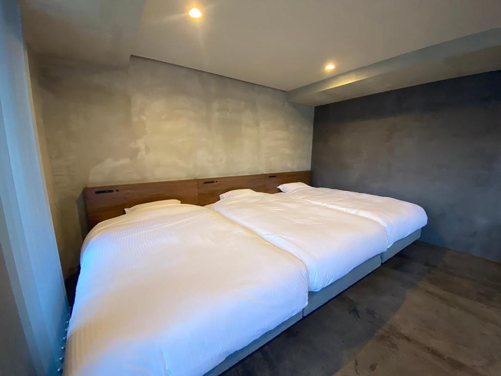 maejima Hotelにあるベッド