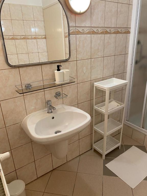 Koupelna v ubytování Global Apartmanház