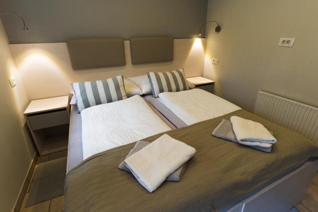 Postel nebo postele na pokoji v ubytování Apartment Kanalec