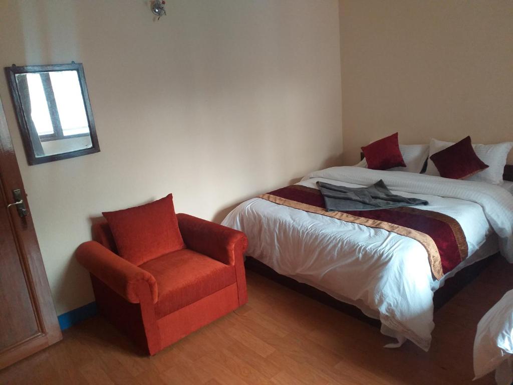 Postel nebo postele na pokoji v ubytování Hotel Silver Jubilee