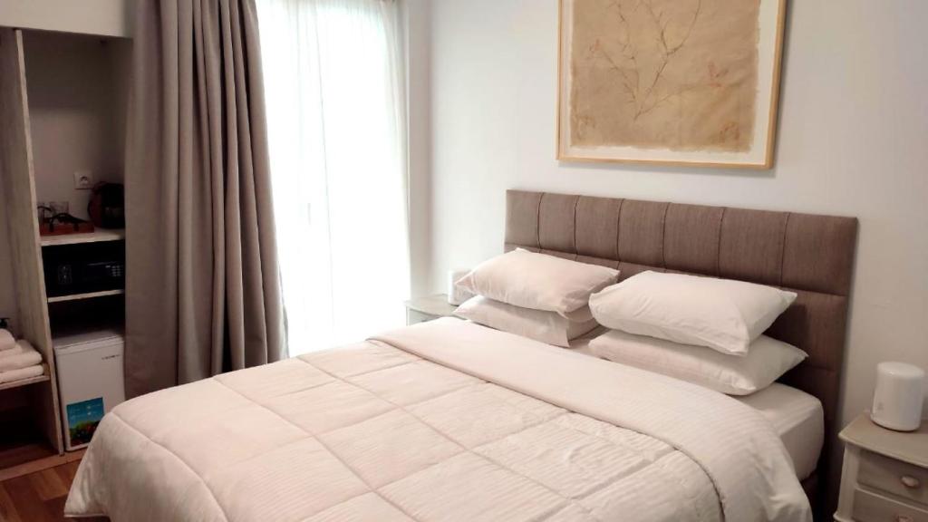 Posteľ alebo postele v izbe v ubytovaní Ulysses Apartments Acropolis