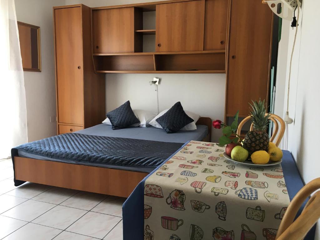 Posteľ alebo postele v izbe v ubytovaní Apartmani Dušanka