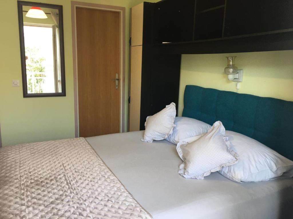 Posteľ alebo postele v izbe v ubytovaní Apartmani Dušanka