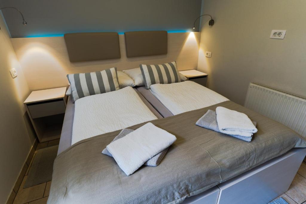 Postel nebo postele na pokoji v ubytování Apartment Kanalec