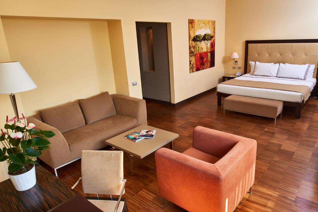Ένα ή περισσότερα κρεβάτια σε δωμάτιο στο Hotel Cruise