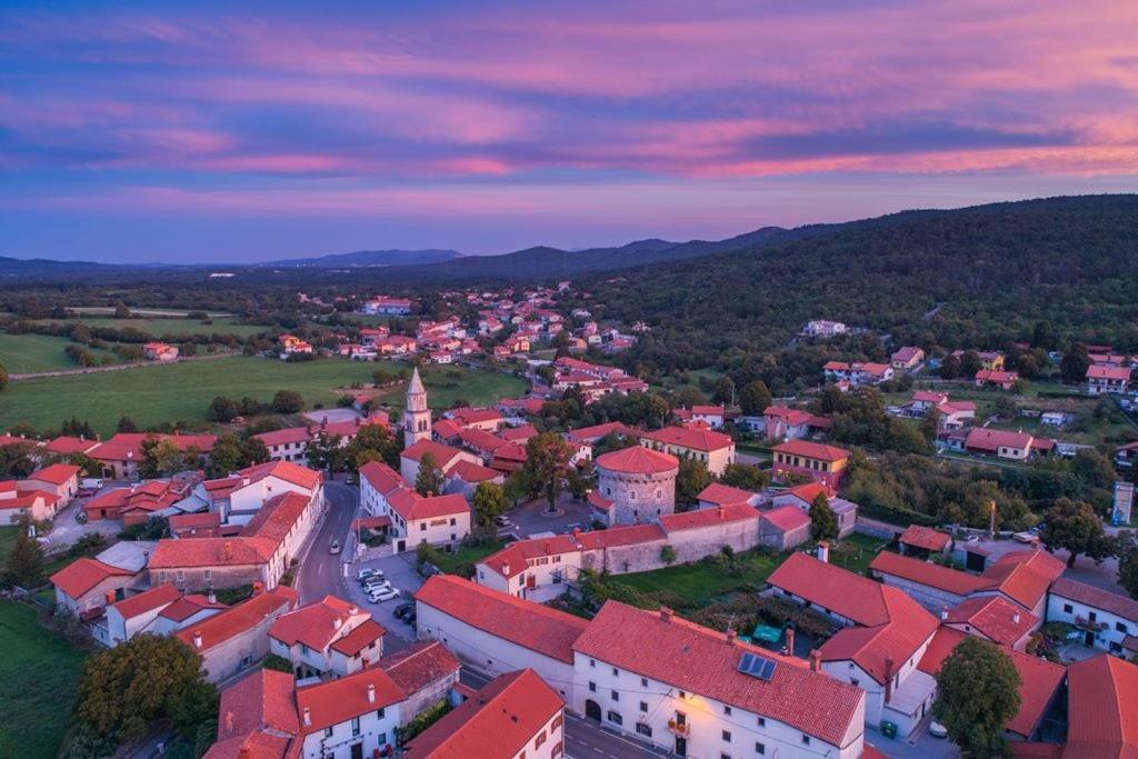 an aerial view of a small town with red roofs at HOSTEL-SezanaLOKEV B&B in Sežana